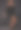 在一个美丽的女模特穿着一件小黑裙的黑色背景上的全长时尚肖像图片下载