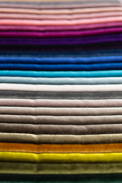 组织目录。多色面料样品目录。纺织行业背景。彩色棉织物。图片下载