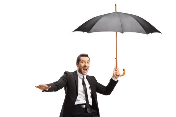 兴奋的商人拿着一把伞图片下载