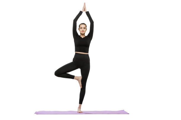 年轻女子做伸展运动和瑜伽练习的肖像在白色工作室背景孤立图片下载