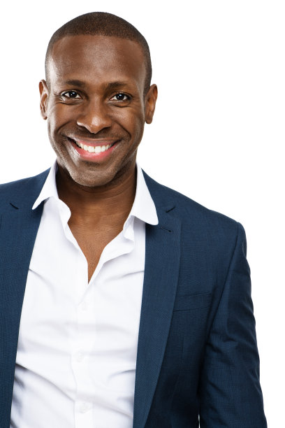 一个英俊的非洲商人在工作室背景下的照片图片下载