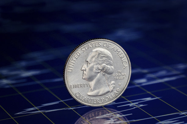 四分之一美元在财务图表上图片下载