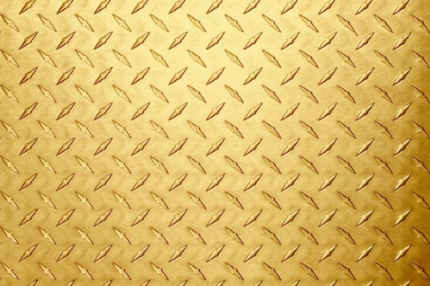 黄铜板材与钻石印刷。黄金的背景图片下载
