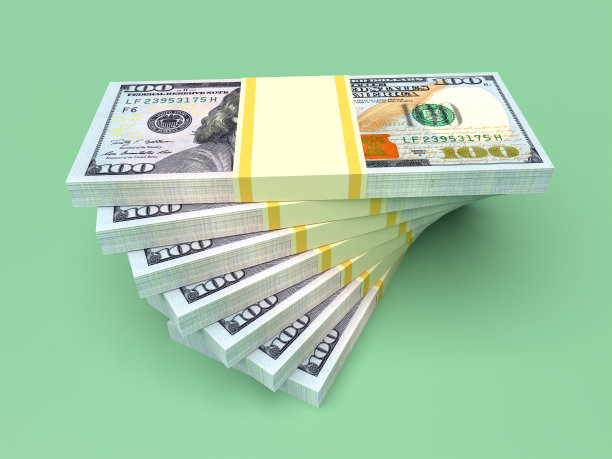 大笔的钱从美元堆起来。美元融资图片下载