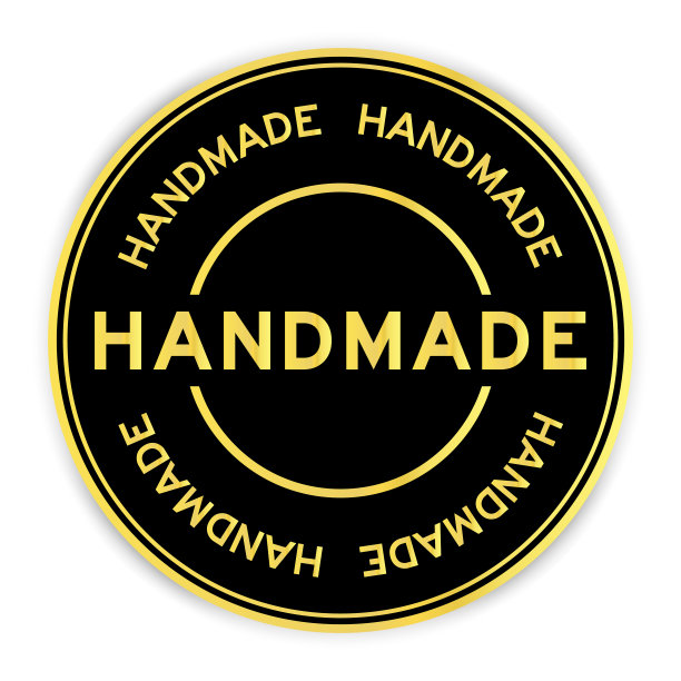 黑色和金色彩色圆形标签贴纸与字手工在白色背景图片下载