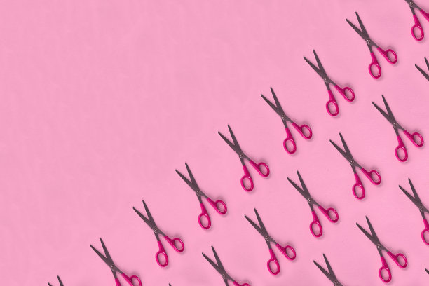 红色背景上的红色剪刀图案图片下载