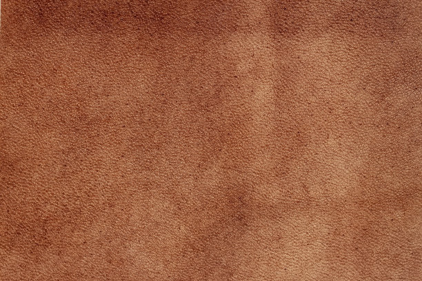 深棕色皮革质感。抽象复古牛皮背景图片下载