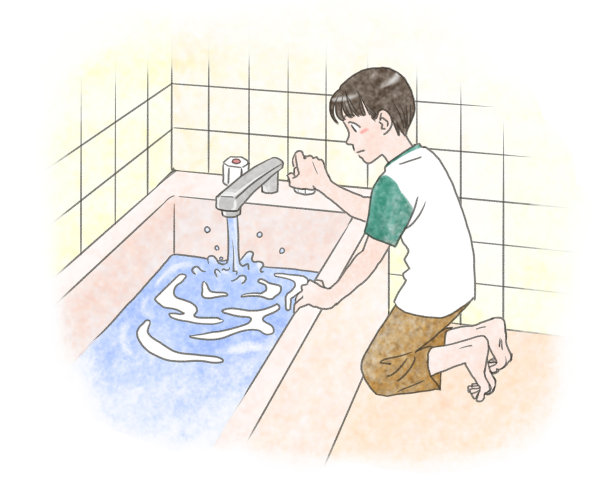 一个男孩把浴缸装满水图片下载