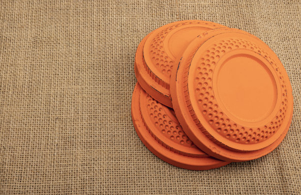 飞行粘土鸽目标在粗麻布背景，射击游戏图片下载