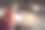 一个笑眯眯的程序员坐在电脑前的照片。图片下载