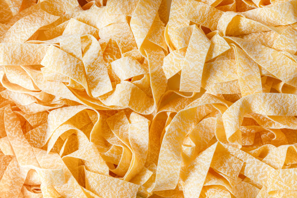 生的生的有机意大利面纹理背景。意大利面源于硬粒小麦美食和意大利面健康的饮食理念。特写镜头图片下载