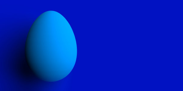 一个复活节彩蛋在蓝色背景与大的复制空间图片下载