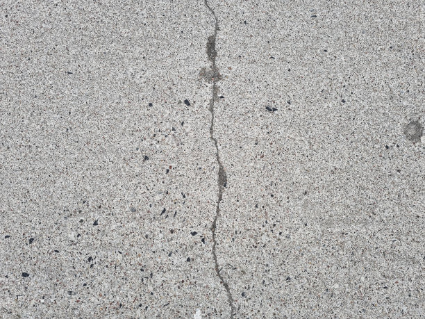 灰色混凝土地板，墙面，表面，灰色纹理上的裂缝图片下载