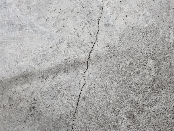 灰色混凝土地板，墙面，表面，灰色纹理上的裂缝图片下载