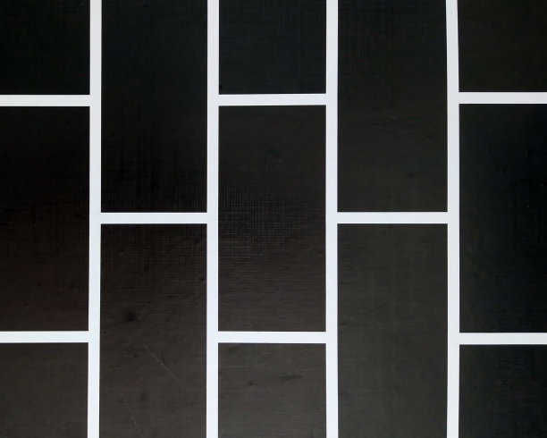 带有网格图案的黑色壁纸的背景图像。图片下载