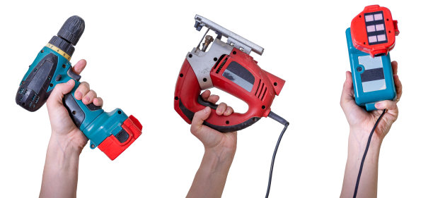 手工具。手握施工工具孤立在白色背景上。图片下载