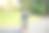亚洲幼儿园的小男孩戴着安全帽，戴着医用口罩骑着自行车在大自然上图片下载