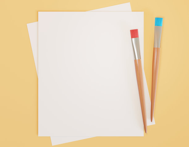 黄色背景上的画笔和空白纸图片下载