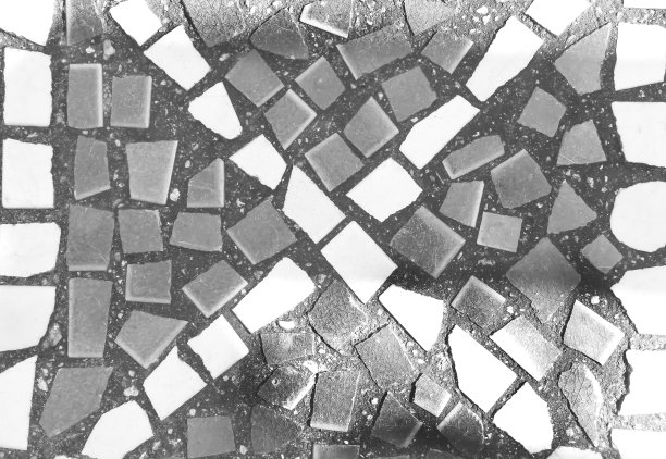 设计块瓷砖装饰在旧地板背景与交叉白色和浅黑色图案俯视图图片下载