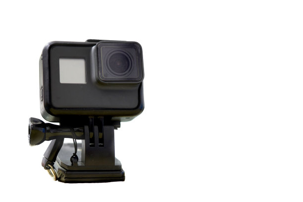 活动摄像机在安装支架上夹在桌子上图片下载