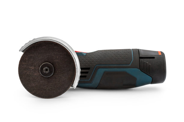 可充电角磨床上的白色背景。图片下载