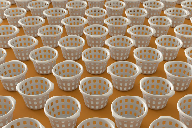 白色洗衣篮在橙色背景，3d渲染图片下载