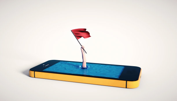 拿着红旗的手拿着手机。图片下载