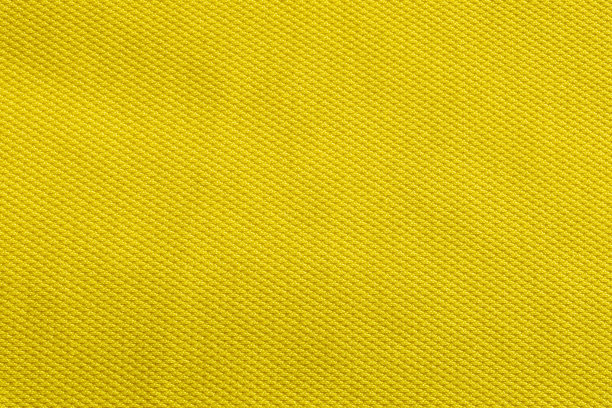 黄色面料，布料涤纶纹理和纺织品背景。图片下载