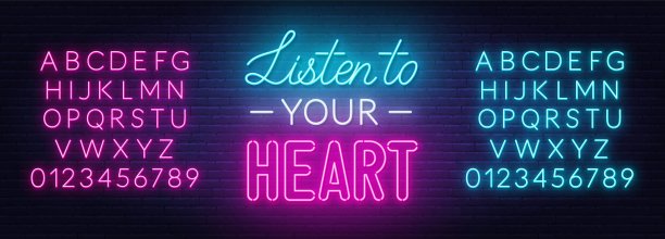 倾听你的心在砖墙背景上的霓虹灯。图片下载