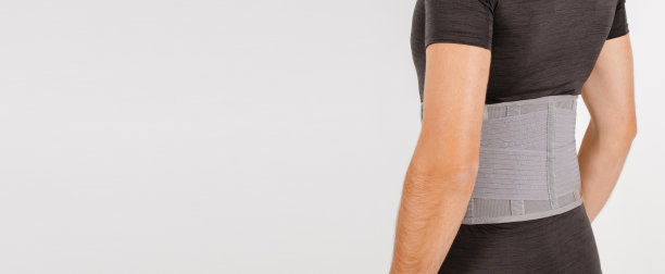人体腰部支架孤立在白色背景上。创伤的回来。背部支撑，骨科腰椎，背部肌肉的支撑带。下背部问题健康图片下载