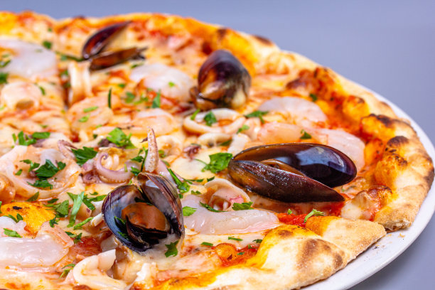 海鲜，贻贝，虾，鱿鱼披萨图片下载