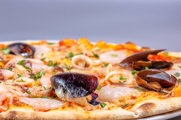 海鲜，贻贝，虾，鱿鱼披萨图片下载