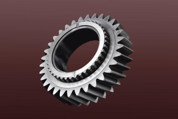 齿轮。汽车变速箱齿轮。机构旋转传动的细节。彩色背景选择性聚焦图片下载