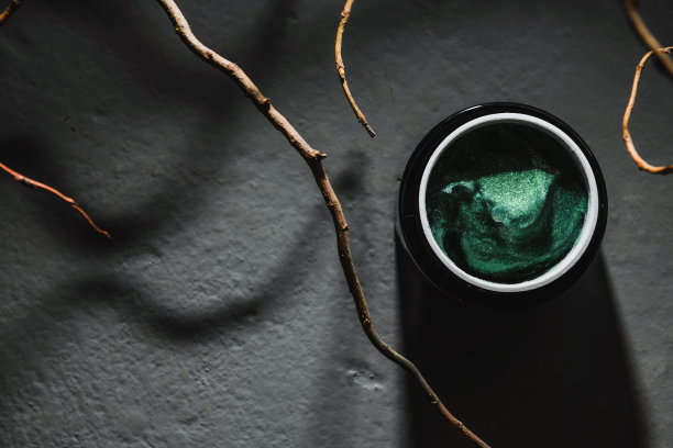 绿色的身体磨砂膏。背景纹理图片下载