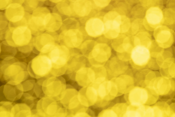金色抽象背景与散景散焦灯光图片下载