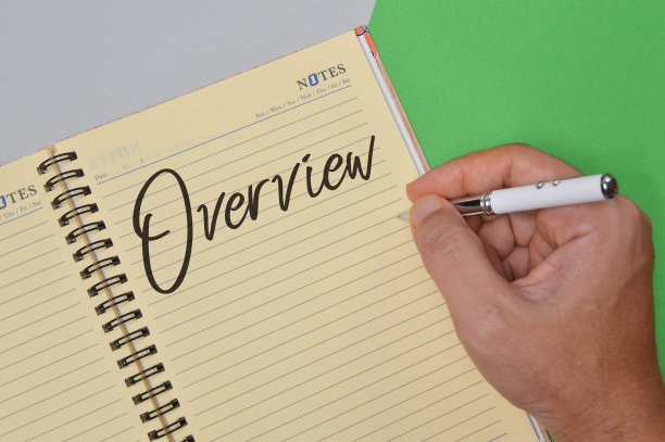 手持笔和书写文字概述。经营理念图片下载