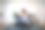 年轻女子坐在舒适的扶手椅和打开的书在室内。图片下载
