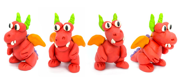 玩白底橡皮泥龙。手工粘土橡皮泥图片下载