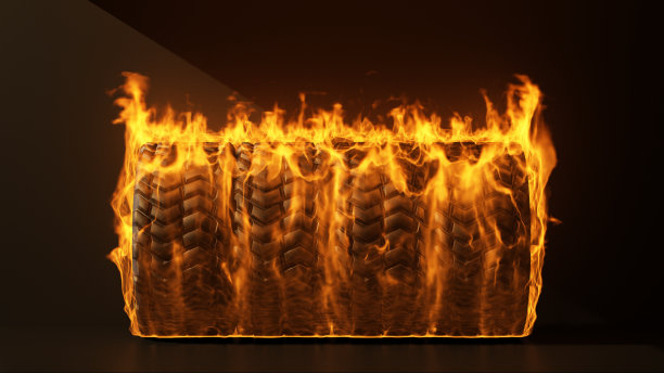 在黑色背景上燃烧四个车轮图片下载