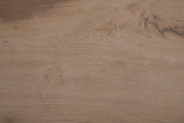 光滑的米色石材表面。陶瓷花岗岩瓷砖。模仿一个木头。图片下载