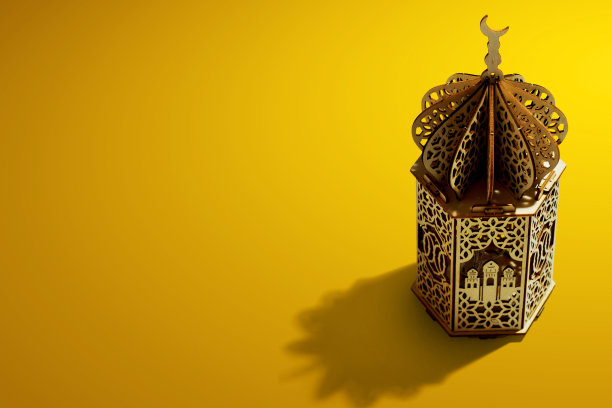 阿拉伯灯笼在黄色背景发光图片下载