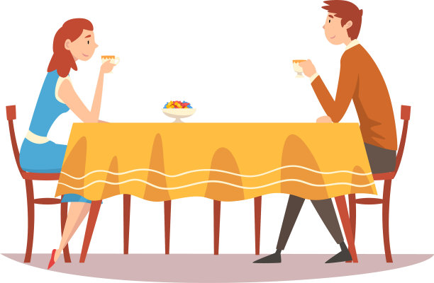 一对家庭夫妇坐在厨房餐桌旁喝酒图片下载