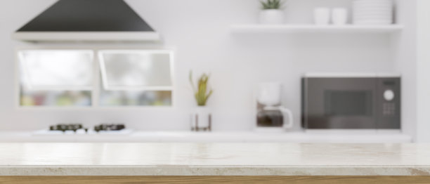 现代厨房桌面与复制空间对抗模糊的现代厨房内部图片下载