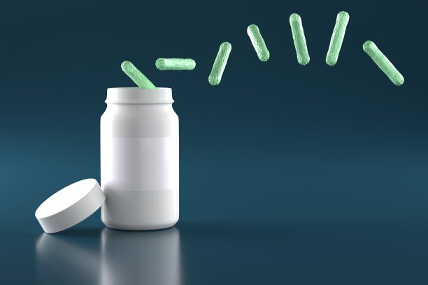 益生菌，膳食补充的概念。有益细菌从白色的罐子里飞出来。三维渲染图片下载