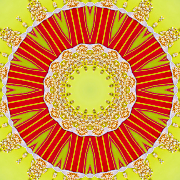 万花筒，曼陀罗，抽象图案，黄色背景的纸桶里的爆米花图片下载