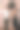准父母们开了个性别公开派对。一对夫妇拿着写有“男孩和女孩”字样的黑色气球。家庭、怀孕和产前护理的概念图片下载