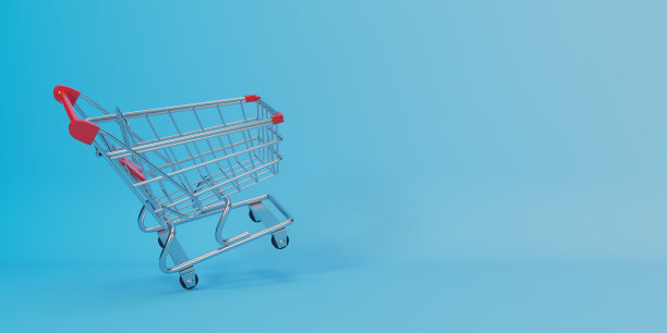 蓝色背景上的金色购物车图片下载