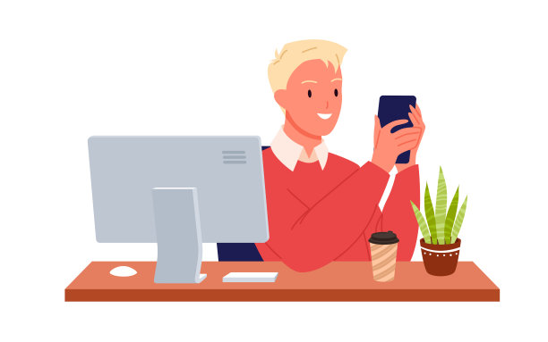年轻人在台式电脑前看智能手机图片下载