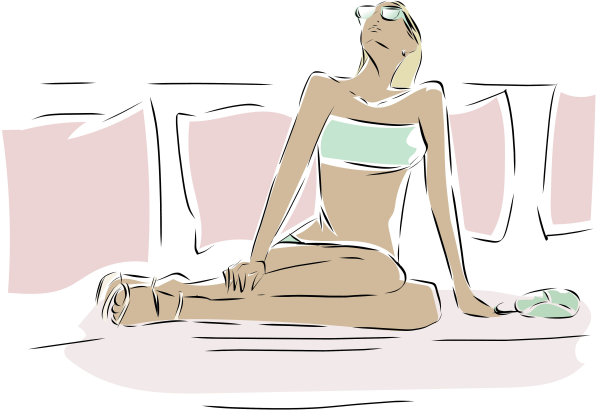 在海滩上享受日光浴的女人图片下载