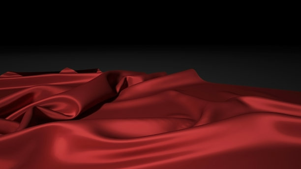 黑色圣诞背景上的红色丝绸。黑色背景与红色帆布图片下载